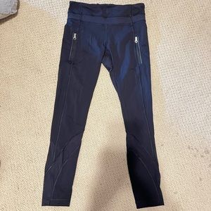 Lululemon Black Inspire Tight Leggings Size 4 Pockets and Mesh 25” inch
